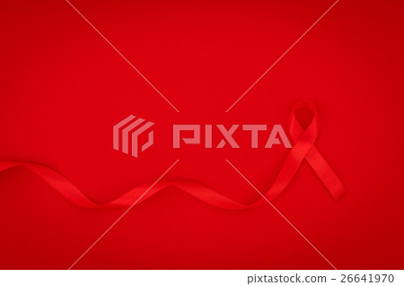Aids Awareness Red heart Ribbon on red background . Aids Awareness Red heart Ribbon on red background . 26641970