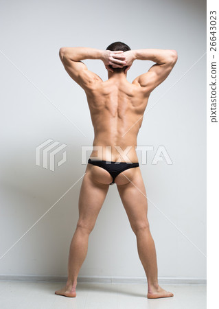 athletic man turned back on white background. 26643023