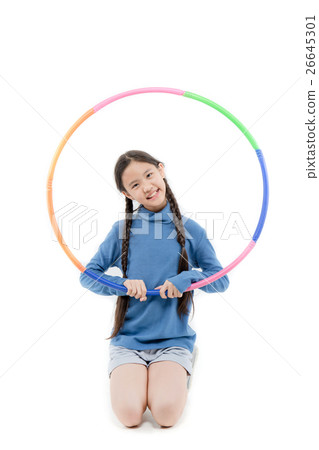 Portrait happy Asian child girl playing hulahoop Portrait happy Asian child girl playing hulahoop 26645301