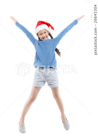 Happy Asian girl with santa hat jumping on isolate Happy Asian girl with santa hat jumping on isolate 26645304