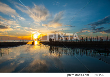 Morning sun at the seaside fishing village. Morning sun at the seaside fishing village. 26645600