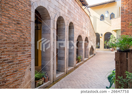 Brown brick cavity and plant decorate 26647758