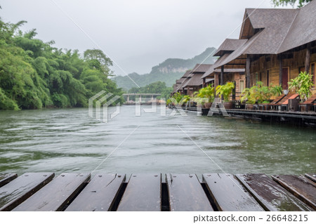 Wooden plank raft on blurred scene resort 26648215
