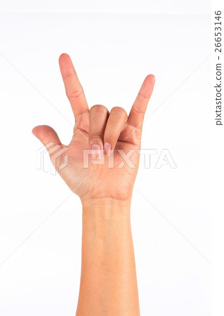 woman giving the devil horns gesture  26653146