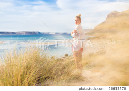 Free Happy Woman Enjoying Last Autumn Sun on Free Happy Woman Enjoying Last Autumn Sun on 26653576