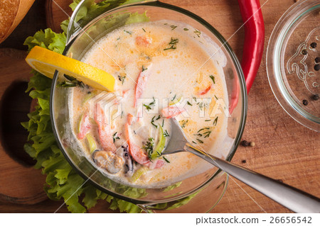 Creamy soup with seafood Creamy soup with seafood 26656542
