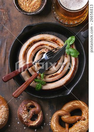 Lager beer with sausage and pretzels Lager beer with sausage and pretzels 26656813