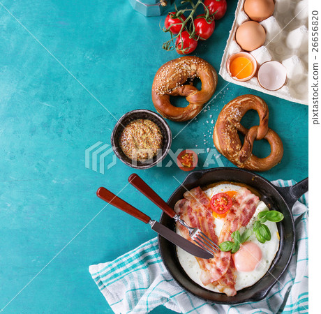 Breakfast with fried eggs and bacon 26656820