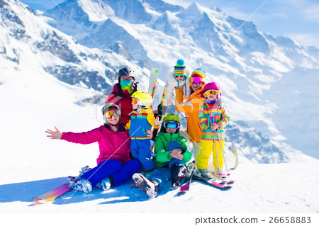 Ski and snow fun. Family in winter mountains. 26658883
