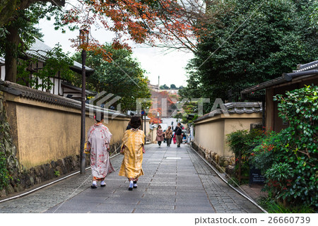 A woman in Kimono 's way and Kimono in autumn 26660739