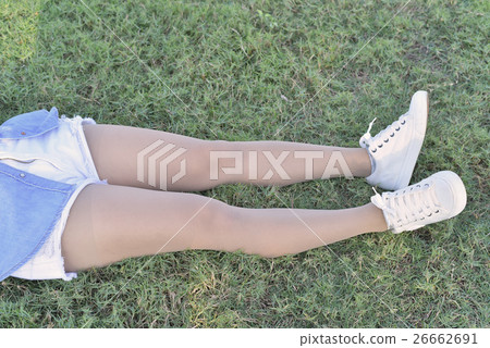 Hop and legs in jeans and legging belongs to girl. Hop and legs in jeans and legging belongs to girl. 26662691