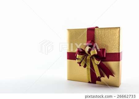 Gold and brown gift box with ribbon bow. Gold and brown gift box with ribbon bow. 26662733
