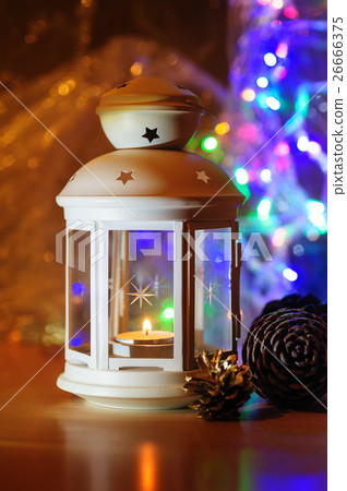 white metal candlestick and blurred colorful 26666375
