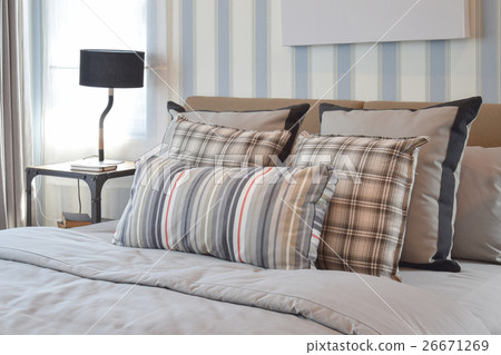 stylish bedroom with striped pillows on bed stylish bedroom with striped pillows on bed 26671269