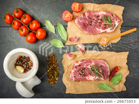 raw beef steak with spices top view raw beef steak with spices top view 26673853