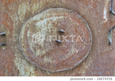 Old metal surface with welded hatch 26674358