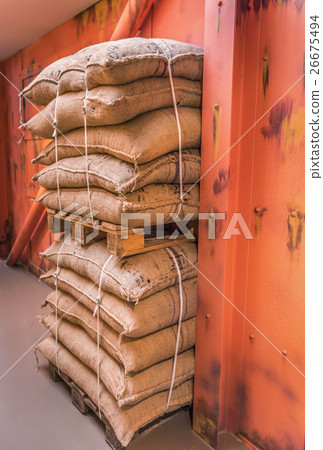 Pallets of merchandise bags stacked in storage Pallets of merchandise bags stacked in storage 26675494