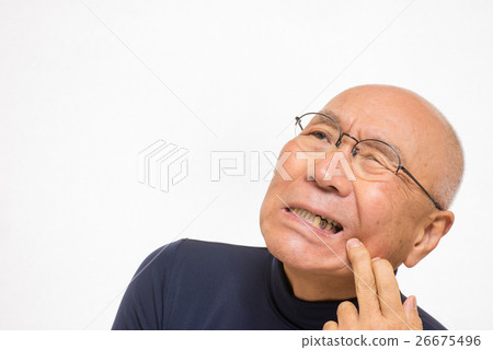 Senior suffering from toothache 26675496