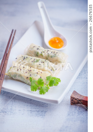 Spring Rolls with Sauce served on the plate Spring Rolls with Sauce served on the plate 26676585
