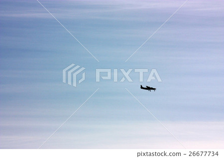 Light plane in winter sky Light plane in winter sky 26677734