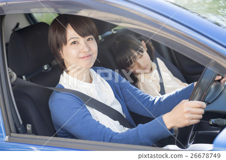 Driving mother and daughter Driving mother and daughter 26678749