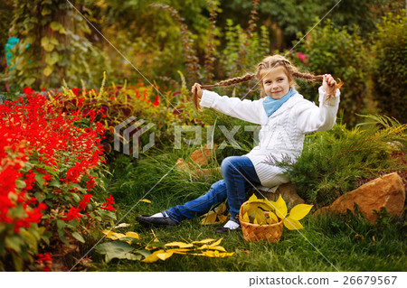 Girl plays fool in autumn park. Girl plays fool in autumn park. 26679567