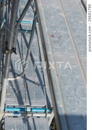 Scaffolding of apartment building outer wall construction 26681790