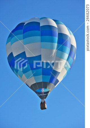 Hot air balloon dancing in early winter 26682073
