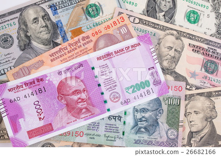 2000 rupee banknote over US dollar banknote. 2000 rupee banknote over US dollar banknote. 26682166