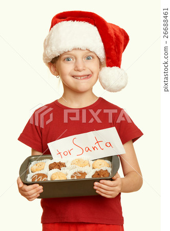 girl in santa hat, christmas holiday yellow toned girl in santa hat, christmas holiday yellow toned 26688461