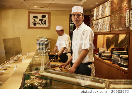 A sushi shop in front 26688973