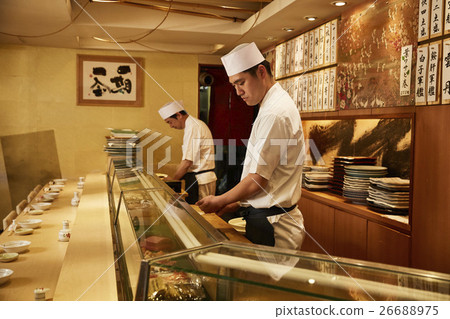 A sushi shop in front 26688975