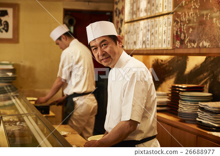 A sushi shop in front 26688977