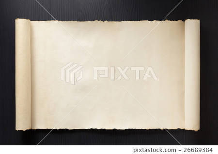 parchment scroll on wood 26689384
