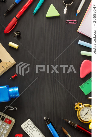 school supplies on black wood school supplies on black wood 26689547