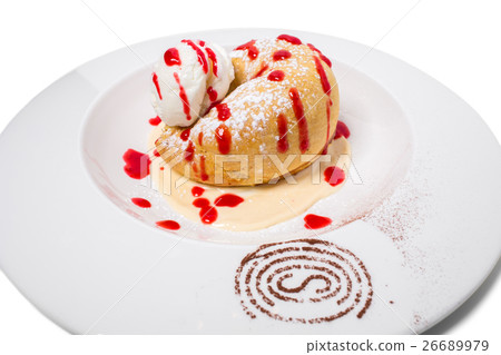 Cinnamon bun with ice cream. 26689979