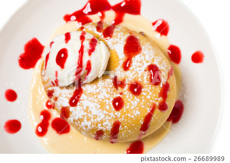 Cinnamon bun with ice cream. 26689989