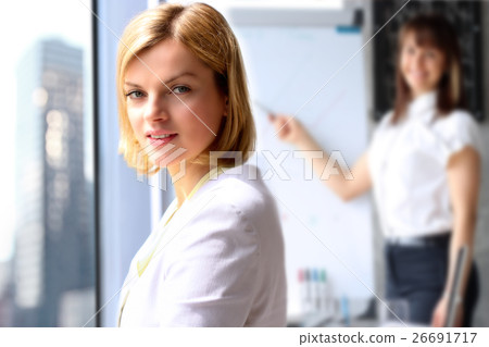 Business woman near window. Presentation Business woman near window. Presentation 26691717
