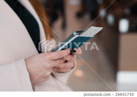 Woman in waiting room of international airport. Woman in waiting room of international airport. 26691730