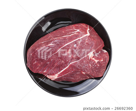 Piece of raw beef isolated on white background 26692360