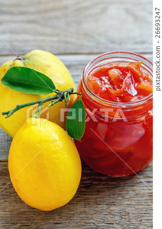 Delicious quince jam in jar and fruit. Delicious quince jam in jar and fruit. 26693247