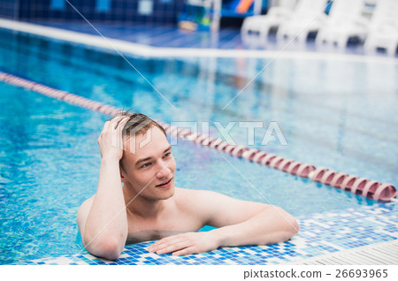 Portrait of young sexy handsome man in swimming Portrait of young sexy handsome man in swimming 26693965