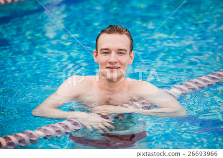Portrait of young sexy handsome man in swimming Portrait of young sexy handsome man in swimming 26693966