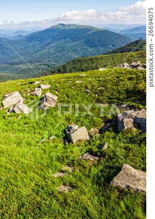 huge stones in valley on top of mountain range huge stones in valley on top of mountain range 26694075