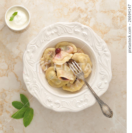 Vareniki with cherries and sour cream Vareniki with cherries and sour cream 26694147