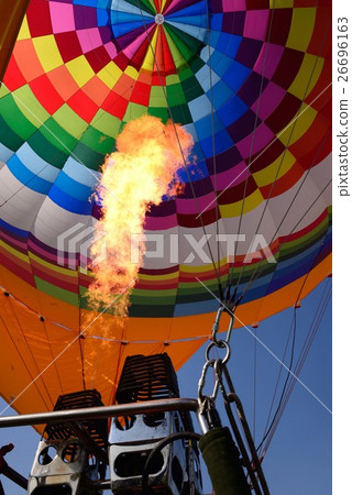 Flame of burner poured into hot air balloon 26696163
