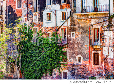 red vintage old brick wall with windows and green red vintage old brick wall with windows and green 26701326