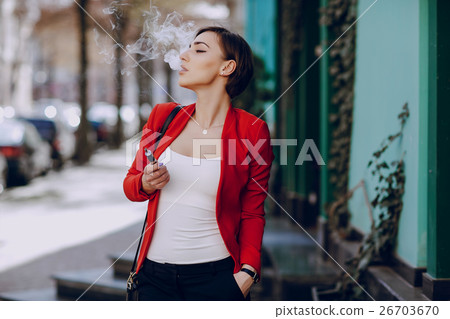 girl with the electronic cigarette 26703670