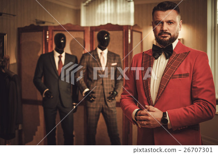 Extravagant stylish man in tailor studio 26707301