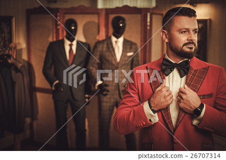 Extravagant stylish man in tailor studio 26707314